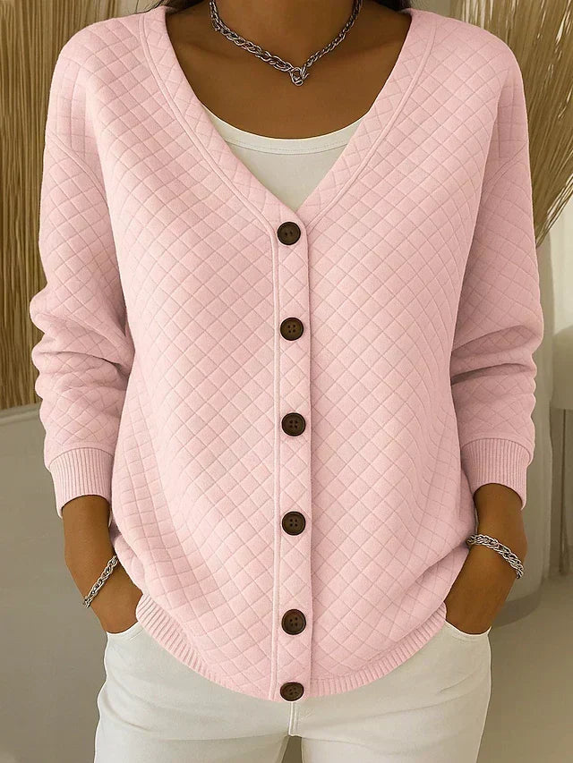 Gewatteerd vest met V-hals en knoopsluiting