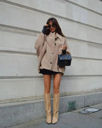 Dames tussenjas in oversized look met knoopsluiting