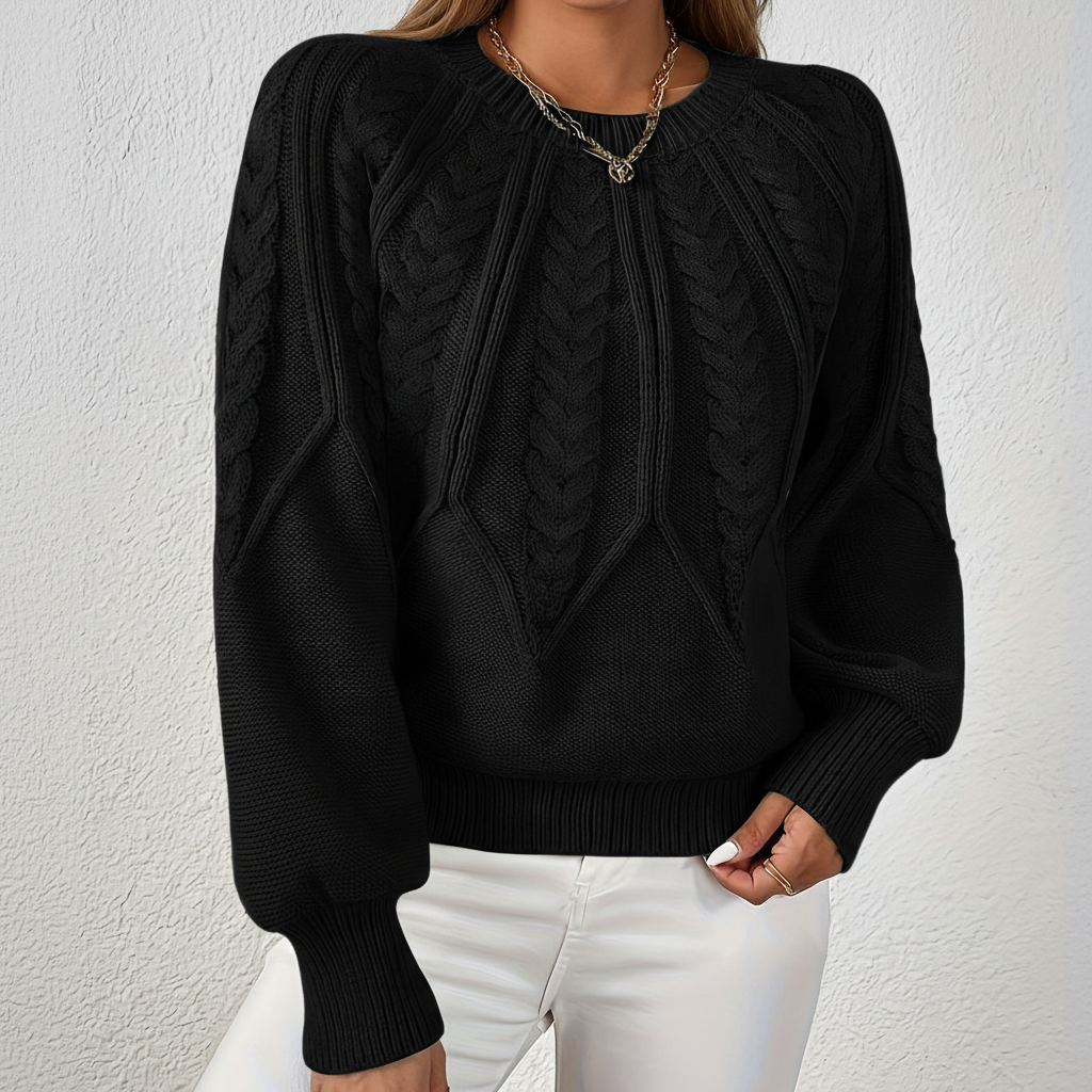 Kabelgebreide trui