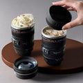 Koffiebeker in de vorm van een cameralens