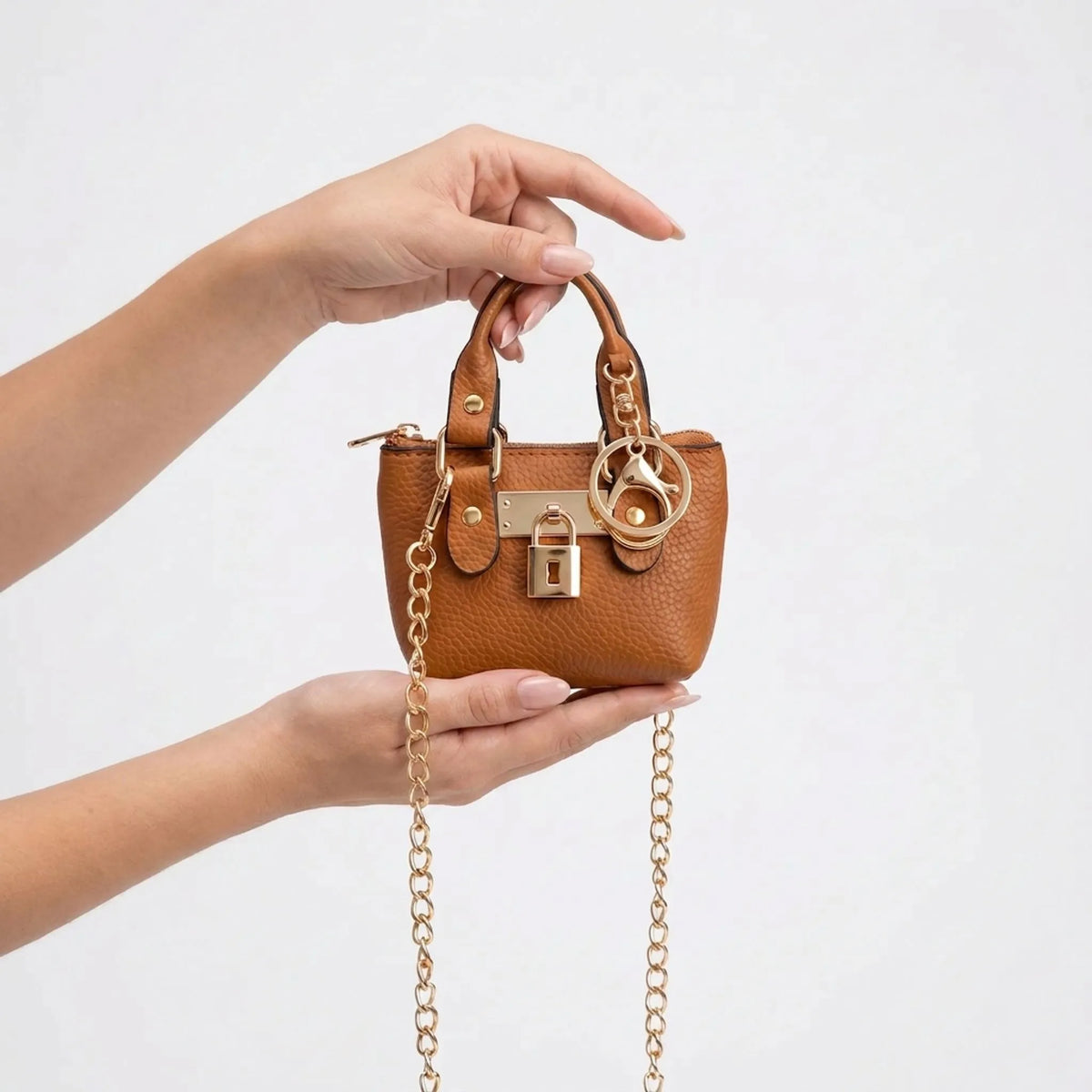 Kleine vormvaste crossbodytas