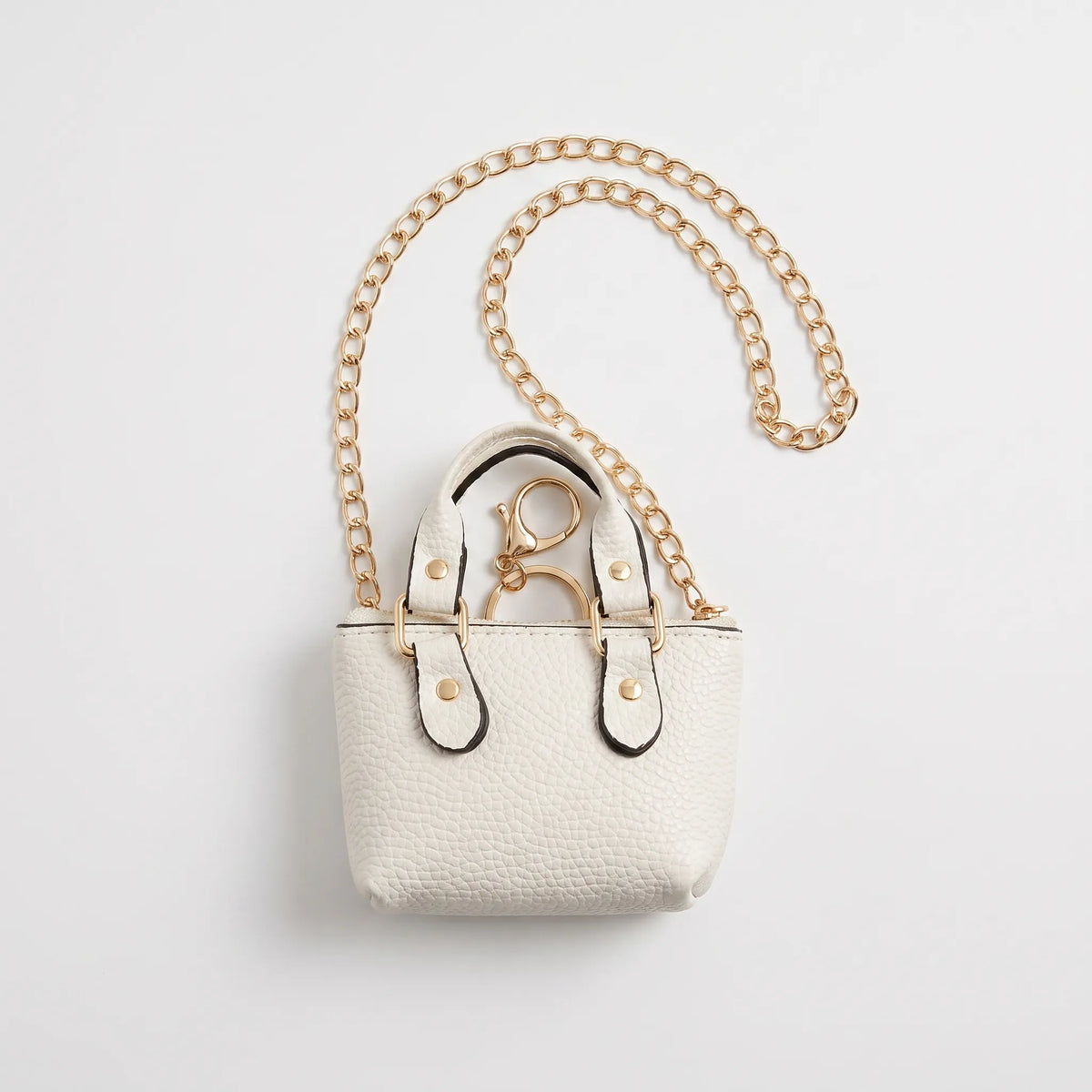 Kleine vormvaste crossbodytas
