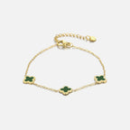 Vergulde armband met groene klaver