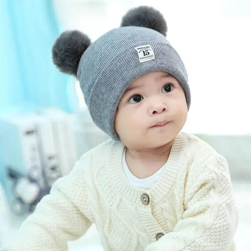 Winter kindermuts met pompom