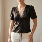 Blouse met kantafwerking