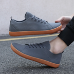 Minimalistische barefoot-sneaker met platte zool