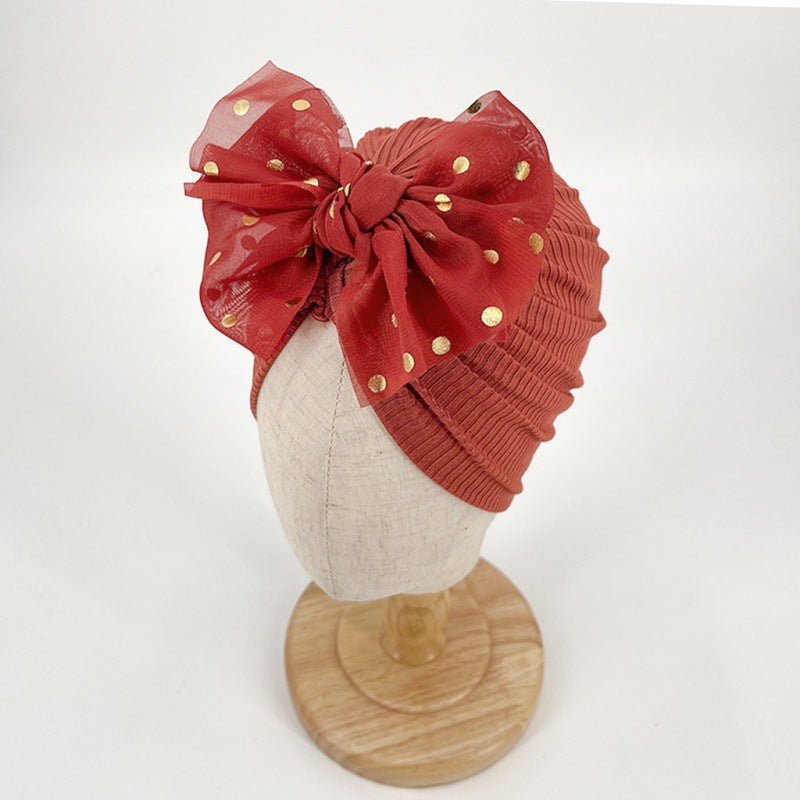 Zachte baby-turbanmuts met ruches – herfstmagie knuffelglans