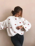 Oversized gebreide trui met geborduurde hartjes