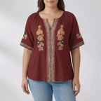 Plussize geborduurde top met korte mouwen