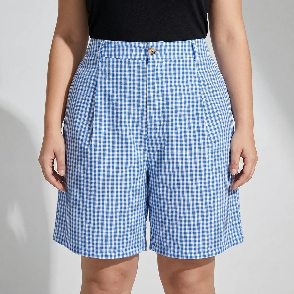 Plus-size geruite shorts met wijde pijpen