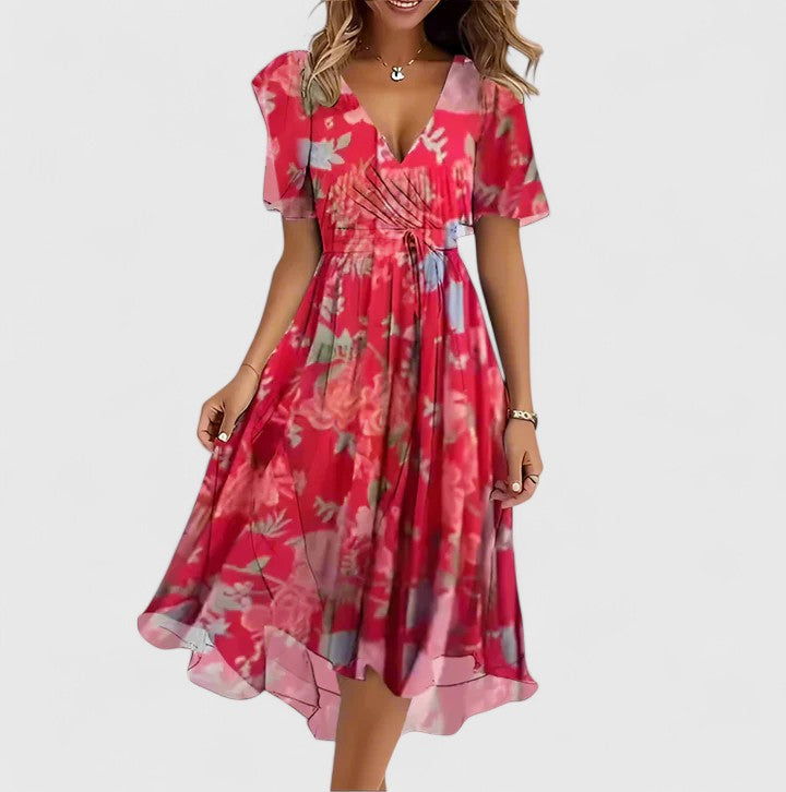 Gina | Korte bloemenjurk met V-hals en asymmetrische zoom