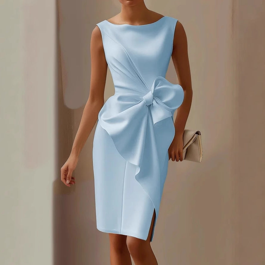 Anisa | Mouwloze jurk met grote strik en asymmetrische details
