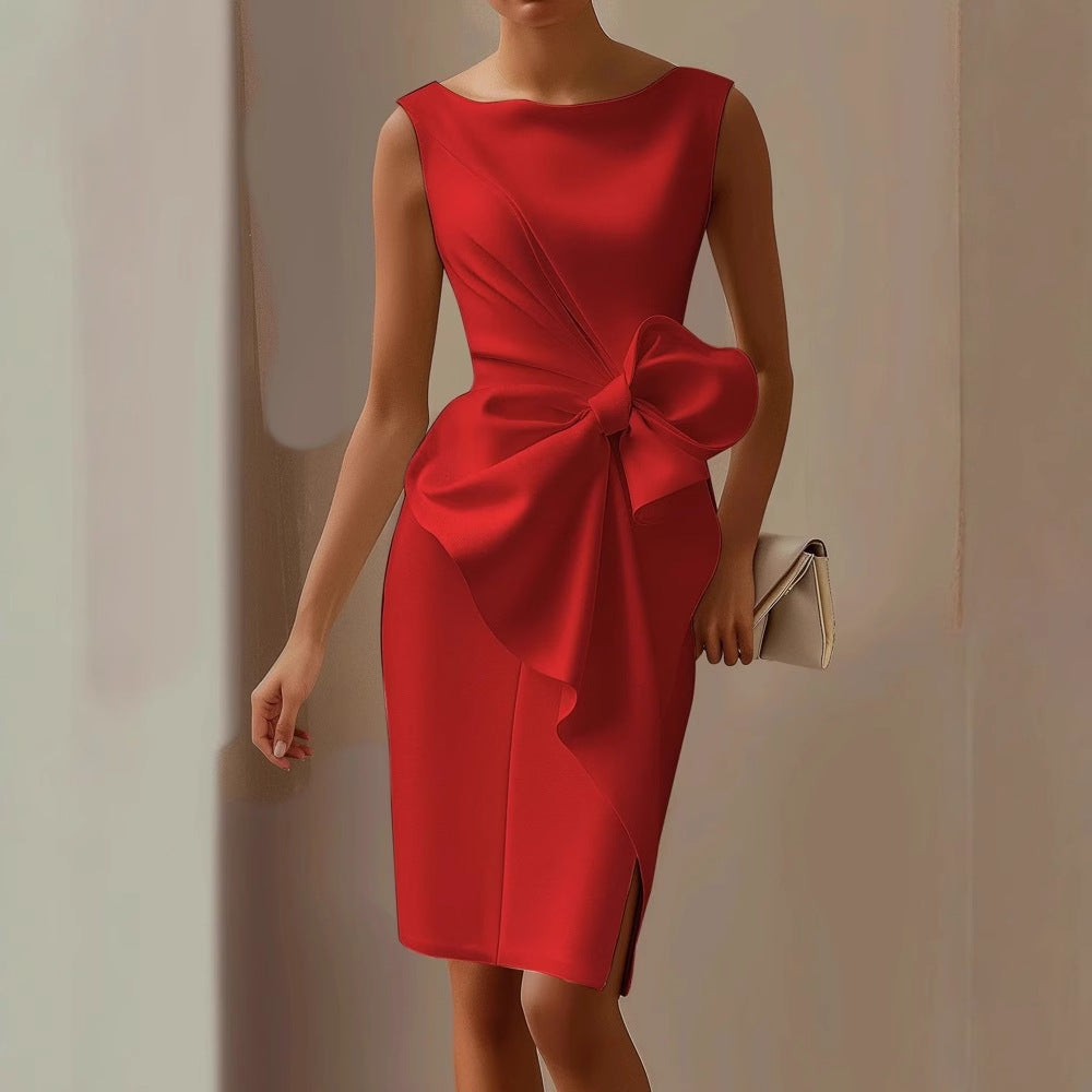 Filomena | Mouwloze jurk met grote strik en drapering