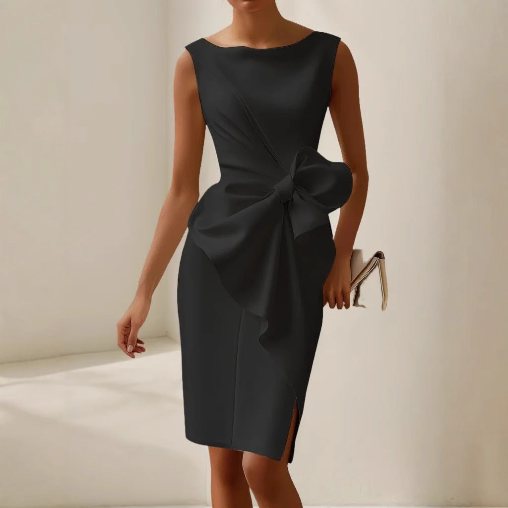 Anisa | Mouwloze jurk met grote strik en asymmetrische details