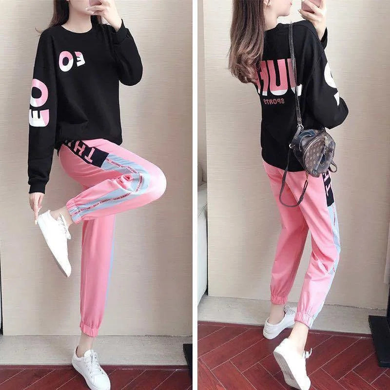 Tweedelig dames trainingspak met sweater en broek