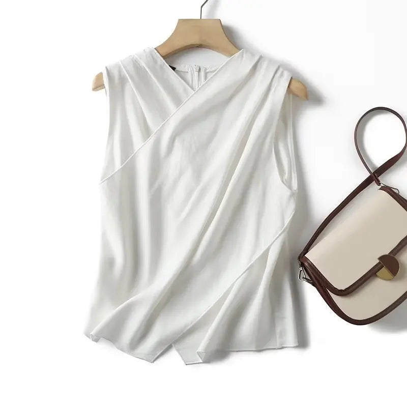 Witte luchtige & stijlvolle mouwloze linnen damesblouse
