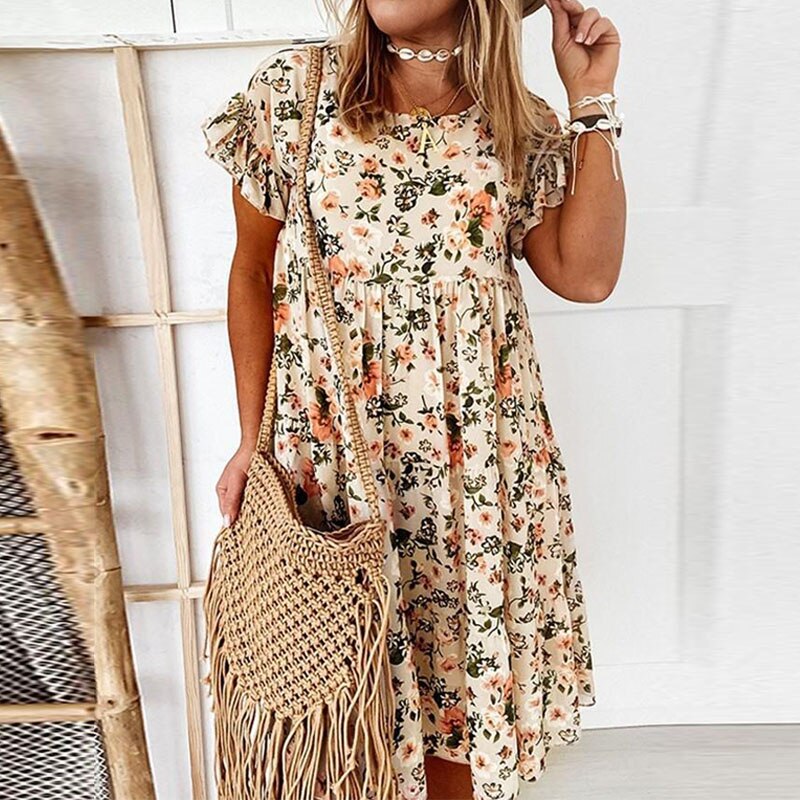 Boho bloemenjurk met ruches en taillesnit
