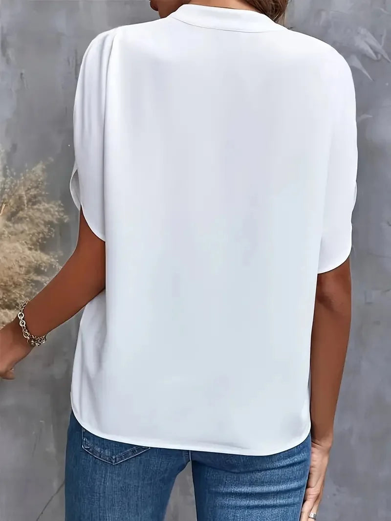 Soepelvallende blouse met V-hals
