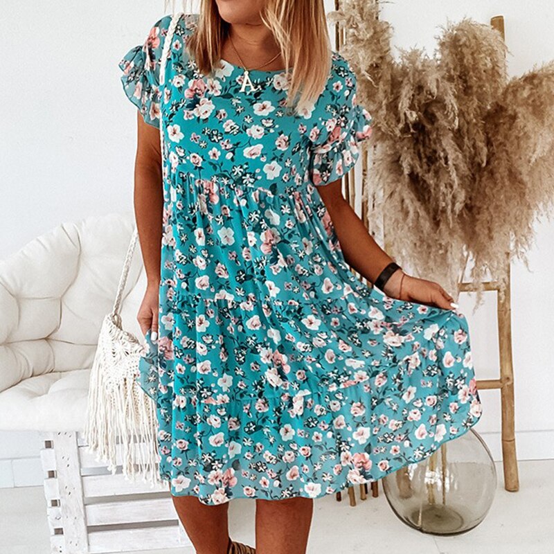 Boho bloemenjurk met ruches en taillesnit