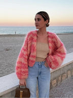 Gestreepte cardigan met open design