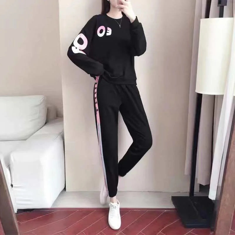 Tweedelig dames trainingspak met sweater en broek