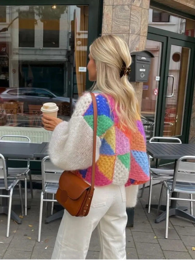 Gestreepte cardigan met open design