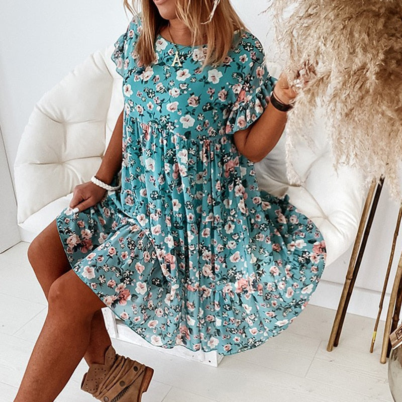 Boho bloemenjurk met ruches en taillesnit
