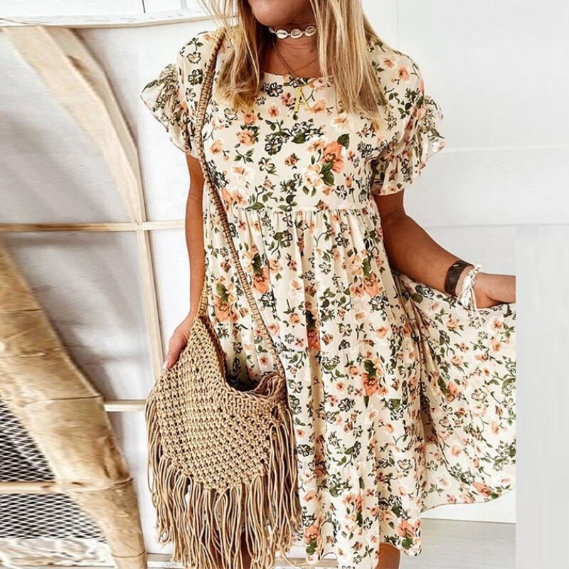 Boho bloemenjurk met ruches en taillesnit