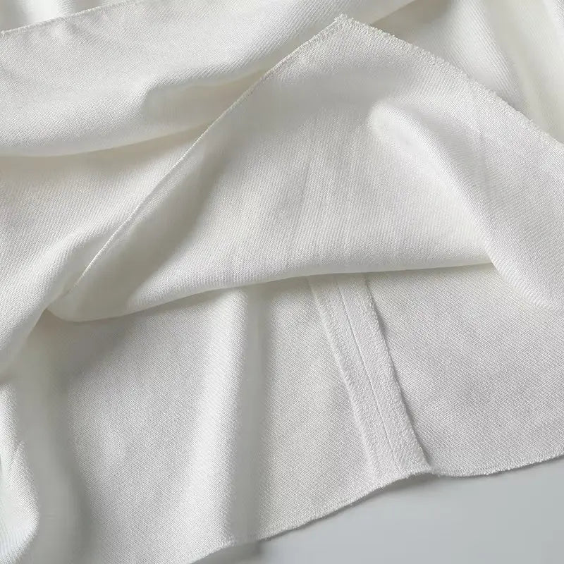 Witte luchtige & stijlvolle mouwloze linnen damesblouse