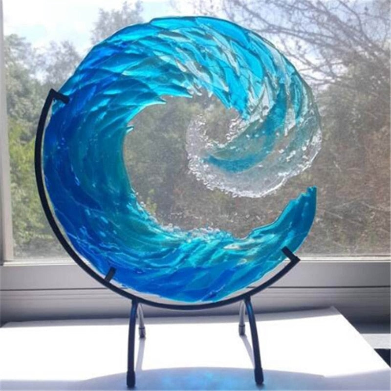 Glazen sculptuur van oceaangolf