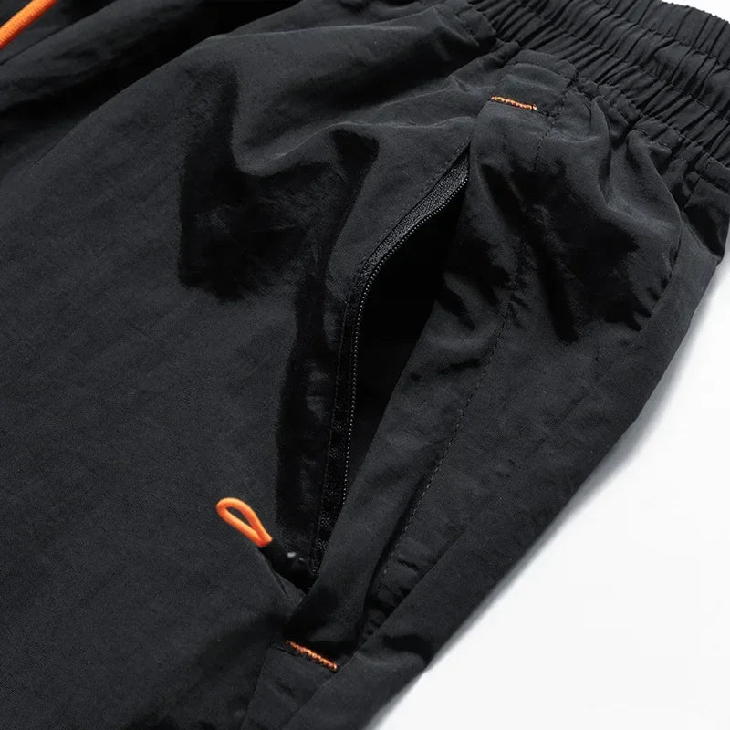 Heren hardloopshorts met mesh binnenbroekje en ritszakken