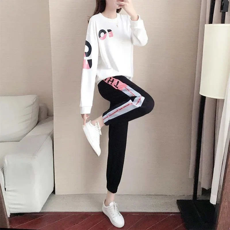 Tweedelig dames trainingspak met sweater en broek