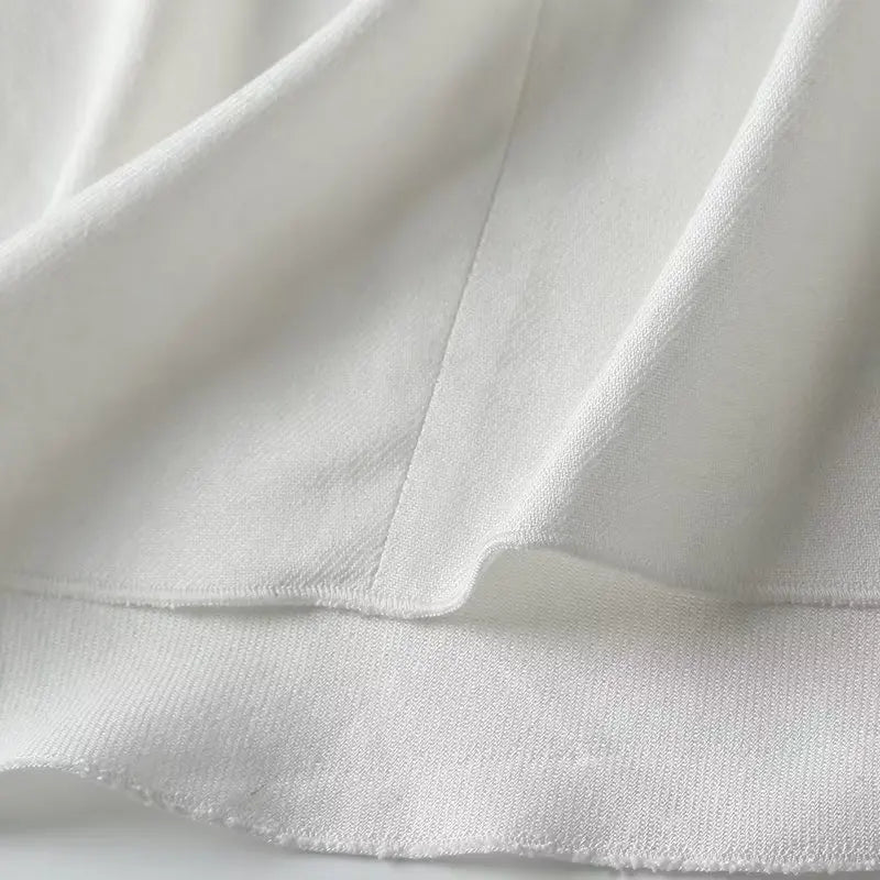Witte luchtige & stijlvolle mouwloze linnen damesblouse