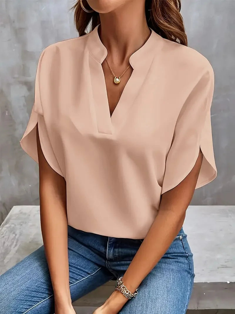 Soepelvallende blouse met V-hals