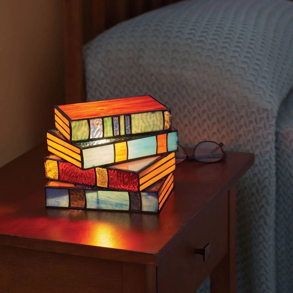 Kunstzinnige gekleurde boekenlamp