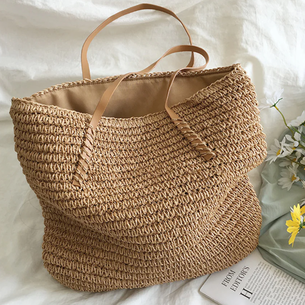 Ruime handtas met schouderband