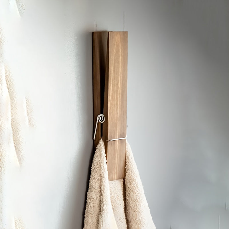 Wandgemonteerde houten handdoekhouder