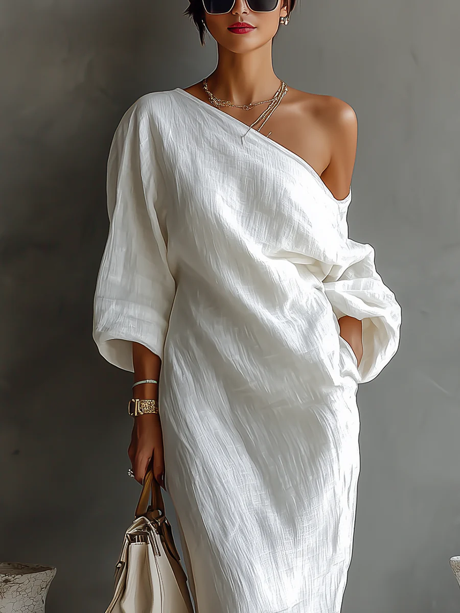 Asymmetrische maxi-jurk met één blote schouder