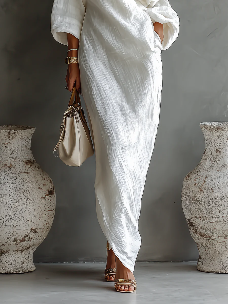 Asymmetrische maxi-jurk met één blote schouder