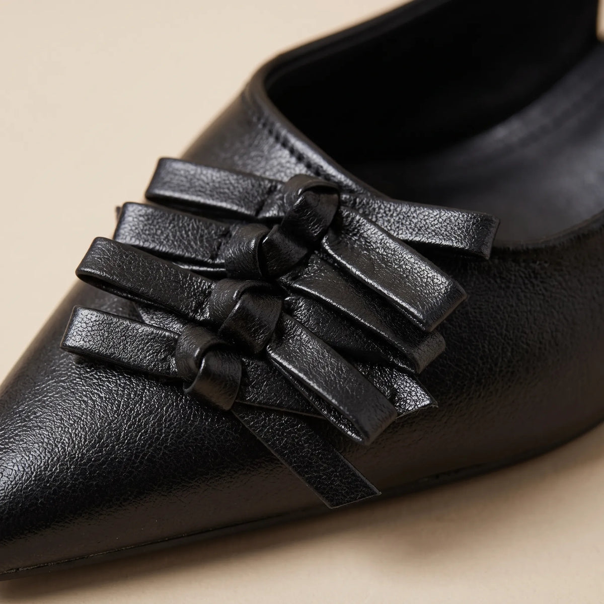 Zwarte slingbacks met spitse neus