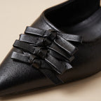 Zwarte slingbacks met spitse neus