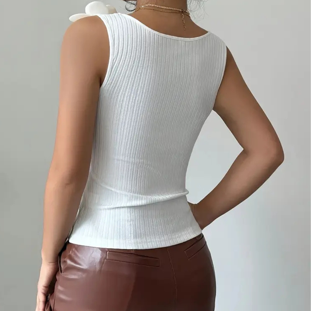 Witte mouwloze dames top met bloemdetails