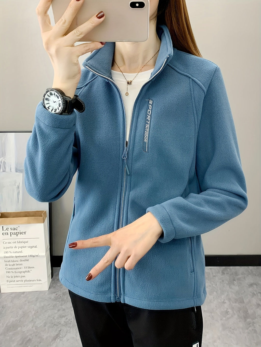 Ademende fleece jas