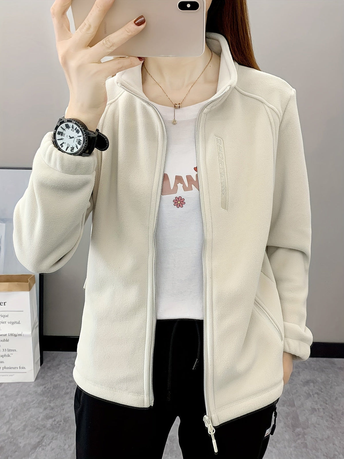 Ademende fleece jas