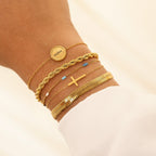 Kruisarmband in goud- en zilverkleur