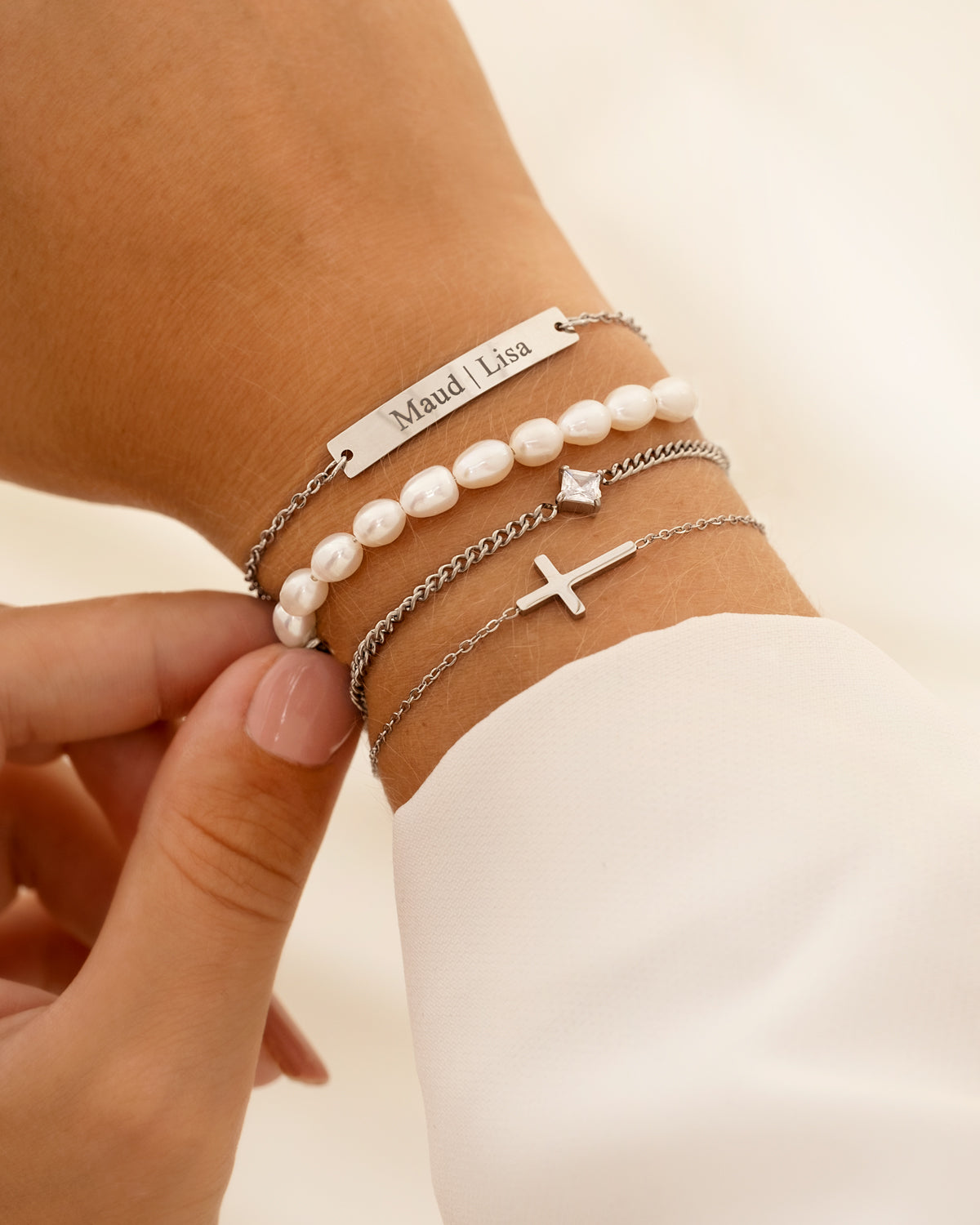 Kruisarmband in goud- en zilverkleur — afbeelding 4