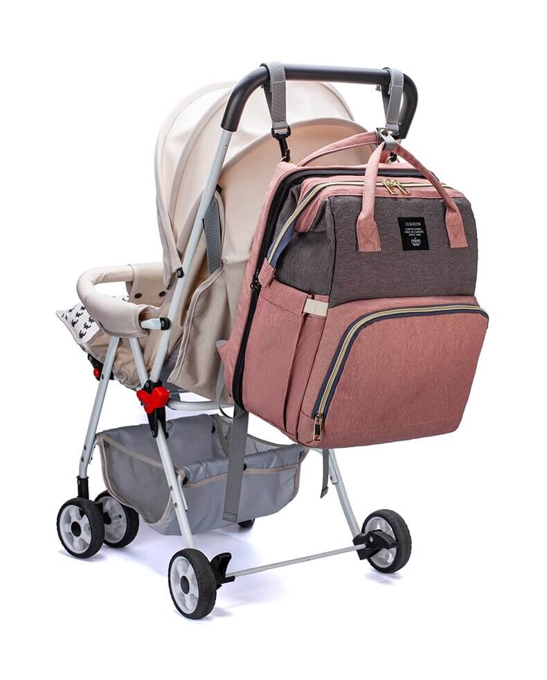 Draagbare babybed en luiertas