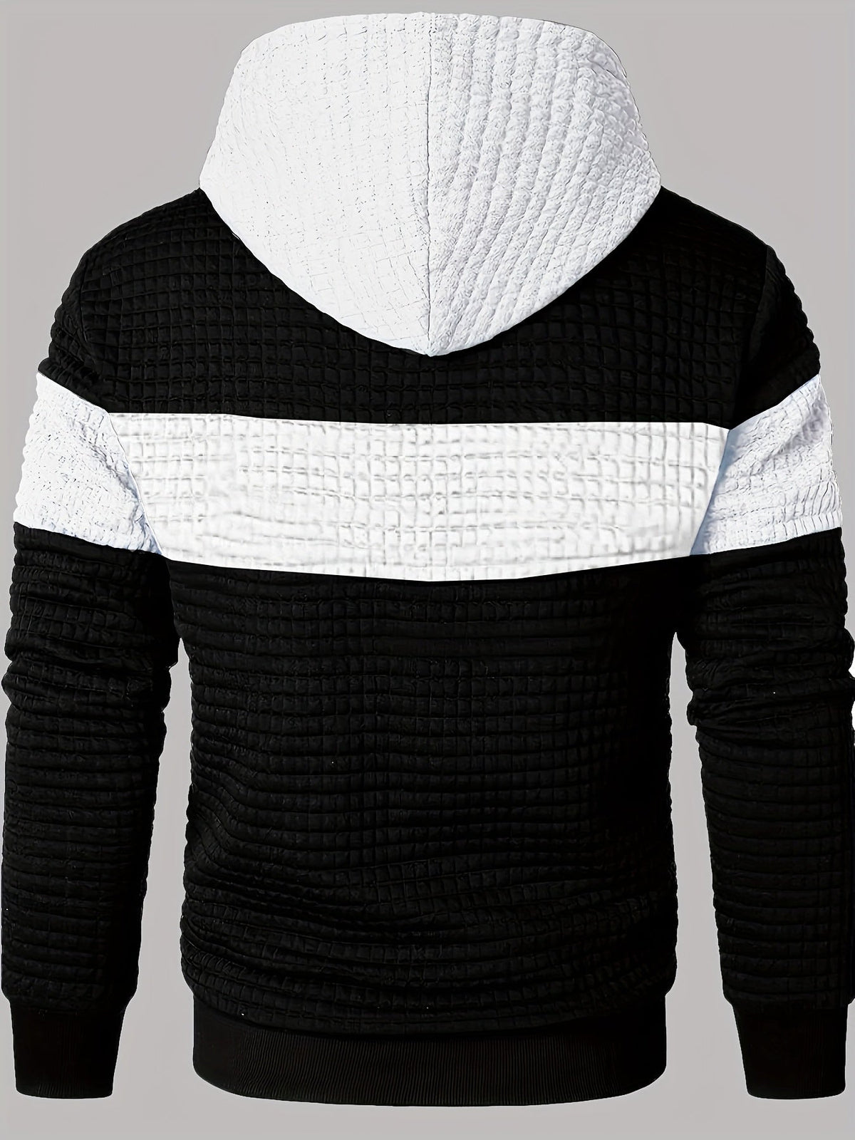 Tweekleurige hoodie met structuur en ribboorden
