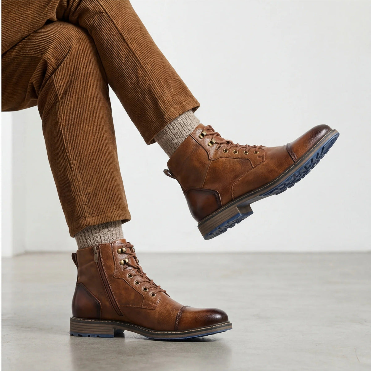 Herenenkelboots van rundleer met neuskap en zijrits