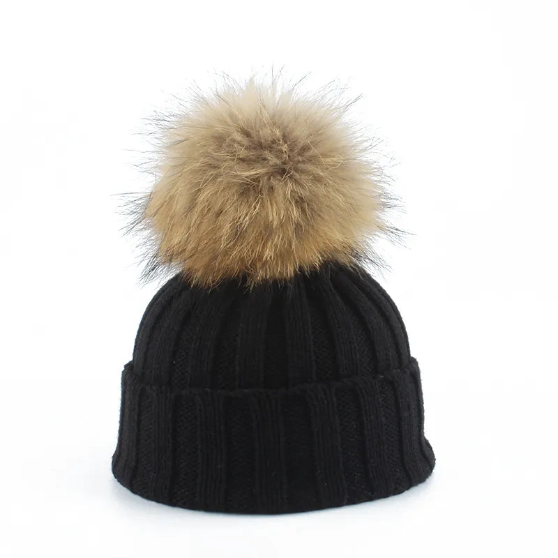 Gebreide winter pom-pom muts